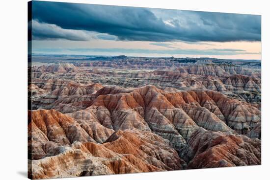 Sunset over Badlands National Park, Sd-James White-Stretched Canvas