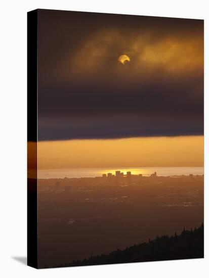 Sunset over Cook Inlet and Downtown Anchorage, Alaska.-Ethan Welty-Stretched Canvas