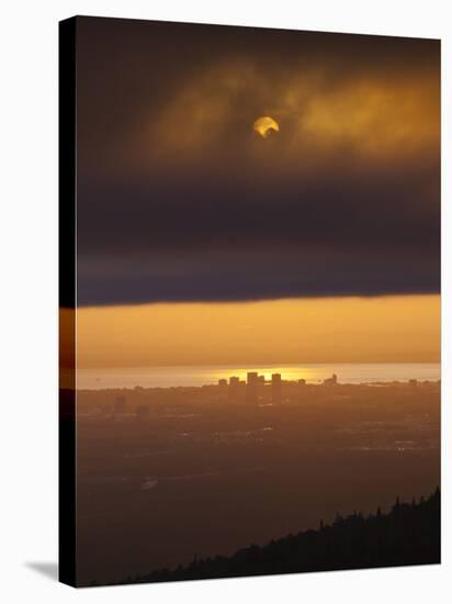Sunset over Cook Inlet and Downtown Anchorage, Alaska.-Ethan Welty-Stretched Canvas