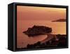 Sunset over Island of Sveti Stefan, Sveti Stefan, the Budva Riviera, Montenegro, Europe-Stuart Black-Framed Stretched Canvas