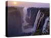 Sunset over Magnificent Victoria Falls, One of Natural Wonders of World-Nigel Pavitt-Stretched Canvas