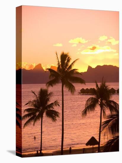 Sunset over Moorea, near Papeete, Tahiti Nui, Society Islands, French Polynesia, South Pacific-Stuart Westmoreland-Stretched Canvas