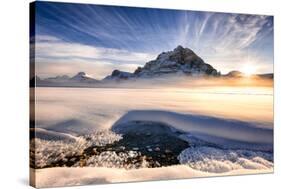 Sunset over mountains at Bow Lake in Banff, Canada during the winter with snow and blue skies-David Chang-Stretched Canvas