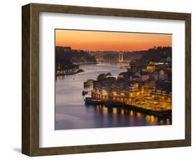 Sunset over Rio Douro. Left Vila Nova de Gaia, right the old town. The old town is listed as UNESCO-Martin Zwick-Framed Photographic Print