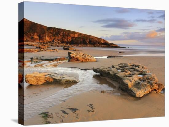 Sunset over Rocks with Flowing Water at Dunraven Bay, Southerndown, Wales-Chris Hepburn-Stretched Canvas