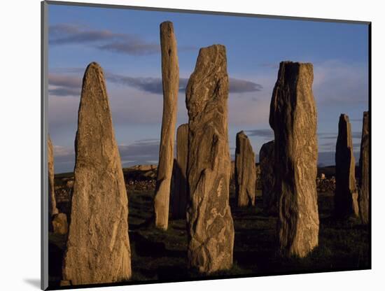 Sunset over the Central Circle of Ancient Standing Stones at Callanish, Dating to Neolithic Times-Mark Hannaford-Mounted Photographic Print