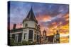 Sunset over the Dunedin Railway Station, Dunedin, South Island, New Zealand-Russ Bishop-Stretched Canvas