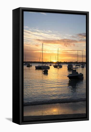 Sunset over the Indian Ocean with Boats in Silhouette on the Calm Water Off the Beach at Gran Baie-Lee Frost-Framed Stretched Canvas