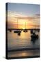 Sunset over the Indian Ocean with Boats in Silhouette on the Calm Water Off the Beach at Gran Baie-Lee Frost-Stretched Canvas