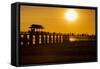 Sunset over the lake near wooden footbridge, Myanmar.-Michele Niles-Framed Stretched Canvas