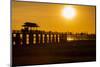 Sunset over the lake near wooden footbridge, Myanmar.-Michele Niles-Mounted Photographic Print