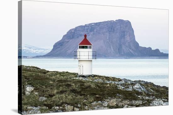 Sunset over the lighthouse in the fishing town of Trana, located on the Arctic Circle, Norway-Michael Nolan-Stretched Canvas