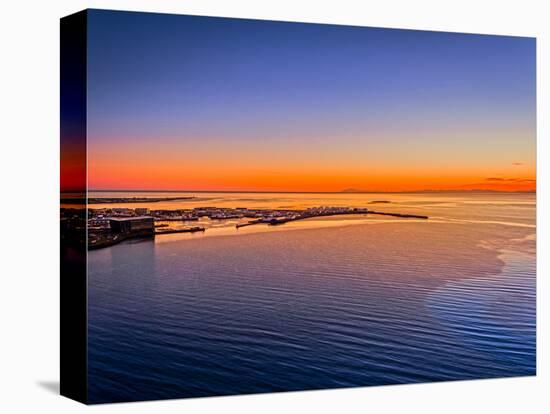 Sunset over the outer harbor of Reykjavik, Reykjavik, Iceland-null-Stretched Canvas