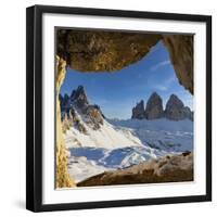 Sunset over the snow capped Tre Cime di Lavaredo and Monte Paterno seen from rock cave-Roberto Moiola-Framed Photographic Print