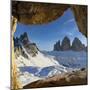 Sunset over the snow capped Tre Cime di Lavaredo and Monte Paterno seen from rock cave-Roberto Moiola-Mounted Photographic Print