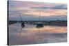 Sunset over the tidal channel at Brancaster Staithe, Norfolk, England, United Kingdom, Europe-Jon Gibbs-Stretched Canvas