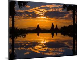 Sunset reflected in the infinity pool at Aureum Palace Hotel, Bagan, Mandalay Region, Myanmar-null-Mounted Photographic Print