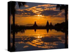 Sunset reflected in the infinity pool at Aureum Palace Hotel, Bagan, Mandalay Region, Myanmar-null-Stretched Canvas