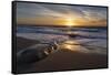 Sunset reflecting off the water on the sand of a beach-Sheila Haddad-Framed Stretched Canvas