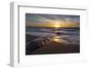 Sunset reflecting off the water on the sand of a beach-Sheila Haddad-Framed Photographic Print