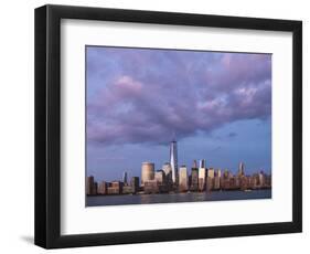 Sunset reflects off the buildings of lower Manhattan, seen from the water, New York City, New York.-Brenda Tharp-Framed Photographic Print