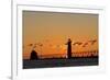 Sunset Silhouettes the Grand Haven Lighthouse in Grand Haven, Michigan, Usa-Chuck Haney-Framed Photographic Print