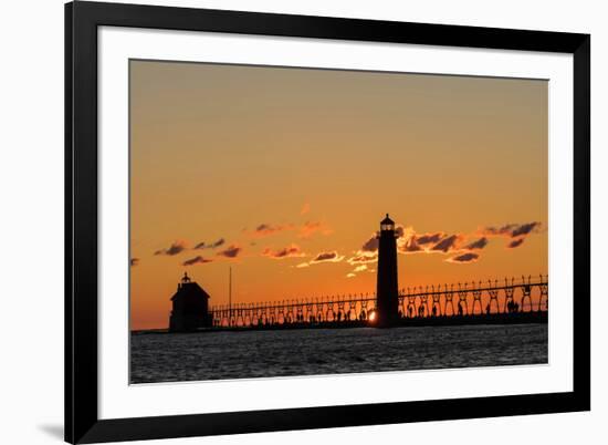 Sunset Silhouettes the Grand Haven Lighthouse in Grand Haven, Michigan, Usa-Chuck Haney-Framed Photographic Print