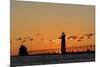 Sunset Silhouettes the Grand Haven Lighthouse in Grand Haven, Michigan, Usa-Chuck Haney-Mounted Photographic Print