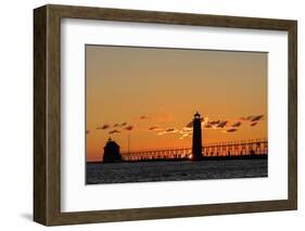 Sunset Silhouettes the Grand Haven Lighthouse in Grand Haven, Michigan, Usa-Chuck Haney-Framed Photographic Print