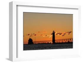 Sunset Silhouettes the Grand Haven Lighthouse in Grand Haven, Michigan, Usa-Chuck Haney-Framed Photographic Print