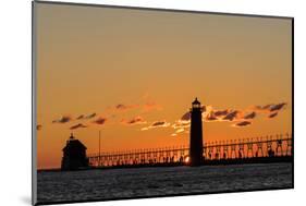 Sunset Silhouettes the Grand Haven Lighthouse in Grand Haven, Michigan, Usa-Chuck Haney-Mounted Photographic Print