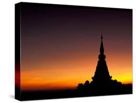 Sunset Sillouhette of Buddhist Temple, Thailand-Merrill Images-Stretched Canvas