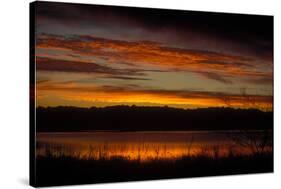Sunset sky over waters of Eagle Creek Reservoir, Ragle Creek Park, Indianapolis, Indiana, USA-Anna Miller-Stretched Canvas