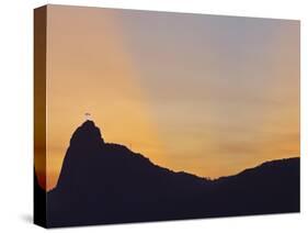 Sunset view of Christ the Redeemer statue and Corcovado Mountain, Rio de Janeiro, Brazil, South Ame-Karol Kozlowski-Stretched Canvas