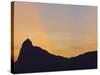 Sunset view of Christ the Redeemer statue and Corcovado Mountain, Rio de Janeiro, Brazil, South Ame-Karol Kozlowski-Stretched Canvas