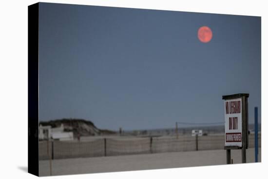 Super Moon and Lifeguard Sign Seen on Atlantic Beach on Long Island, NY-null-Stretched Canvas