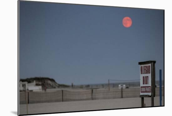 Super Moon and Lifeguard Sign Seen on Atlantic Beach on Long Island, NY-null-Mounted Photo