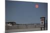 Super Moon and Lifeguard Sign Seen on Atlantic Beach on Long Island, NY-null-Mounted Photo