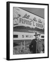 Super Rich Texas Millionaires William Likins Standing in Front of Sign at Main Entrance to Ranch-Michael Rougier-Framed Premium Photographic Print