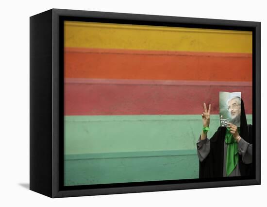 Supporter of Mir Hossein Mousavi Hides Her Face as She Waits at an Election Rally in Tehran-null-Framed Stretched Canvas
