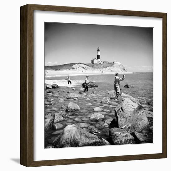 Surf Casting Fishermen Working the Shore Near the Historic Montauk Point Lighthouse-Alfred Eisenstaedt-Framed Photographic Print