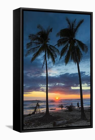 Surfer and Palm Trees at Sunset on Playa Guiones Surf Beach at Sunset-Rob Francis-Framed Stretched Canvas