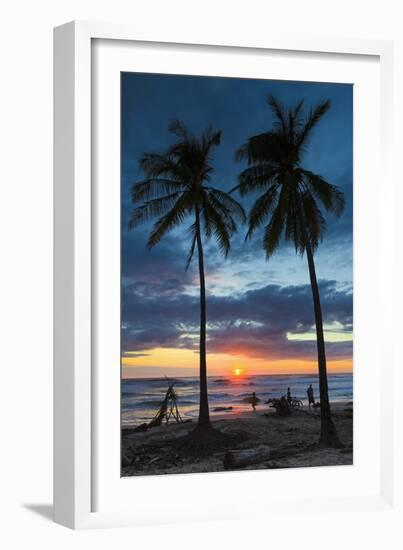 Surfer and Palm Trees at Sunset on Playa Guiones Surf Beach at Sunset-Rob Francis-Framed Photographic Print