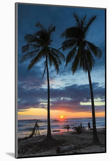 Surfer and Palm Trees at Sunset on Playa Guiones Surf Beach at Sunset-Rob Francis-Mounted Photographic Print