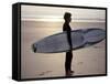 Surfer on a Beach, North Devon, England-Lauree Feldman-Framed Stretched Canvas