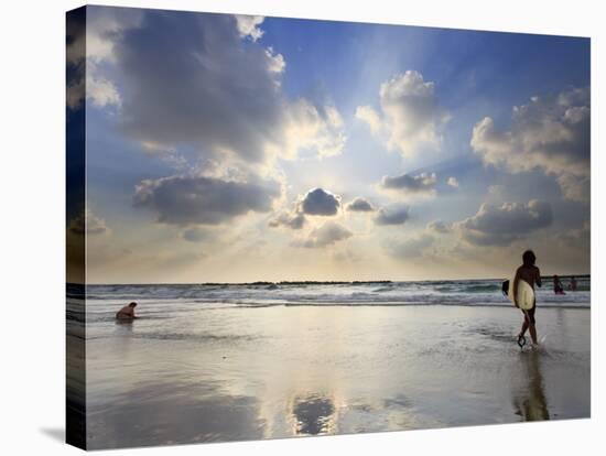 Surfer on City Beach, Tel Aviv, Israel-Michele Falzone-Stretched Canvas