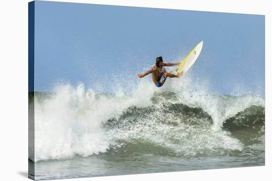 Surfer on Shortboard Riding Wave at Popular Playa Guiones Surf Beach-Rob Francis-Stretched Canvas