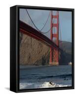 Surfer Rides a Wave Near the Golden Gate Bridge in San Francisco-null-Framed Stretched Canvas