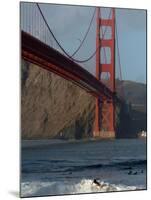 Surfer Rides a Wave Near the Golden Gate Bridge in San Francisco-null-Mounted Photographic Print