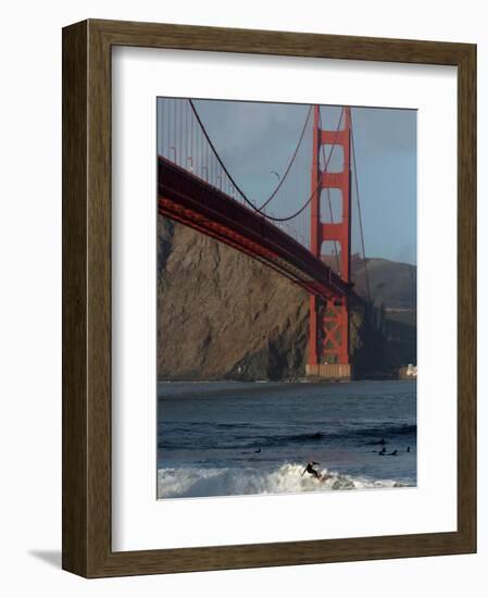 Surfer Rides a Wave Near the Golden Gate Bridge in San Francisco-null-Framed Photographic Print